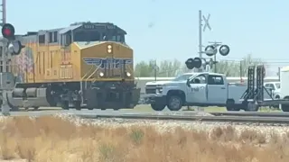 WATCH Train hits truck stuck on tracks in Midland County