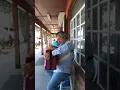 Cantando afuera de Vera s meat market Alex