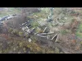 Aerial footage of crews working to put derailed train cars back on track in Ravenna