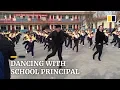Download Lagu Chinese school principal teaches students shuffle dance during break
