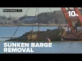 Crews work to pull out sunken barge out of Providence River