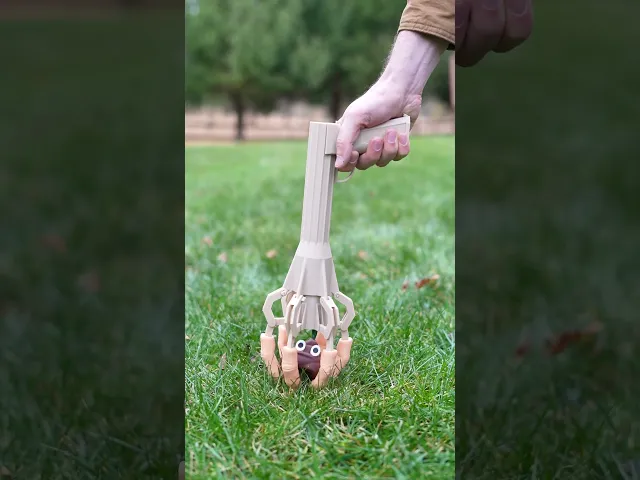Poo Plucker - Mechanical hand for picking up dog poop - Built in bag dispenser video thumbnail