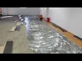 Applying pressure sensitive adhesive and dry time fir glue down LVT installation