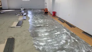 Applying pressure sensitive adhesive and dry time fir glue down LVT installation
