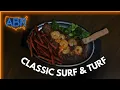 Shrimp and Steak Served on a Skillet - Lakeside Seafood Steak