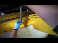 POV Underneath your car at a jiffy lube