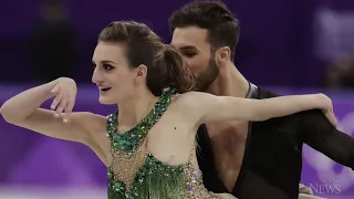 French figure skater powers through wardrobe malfunction
