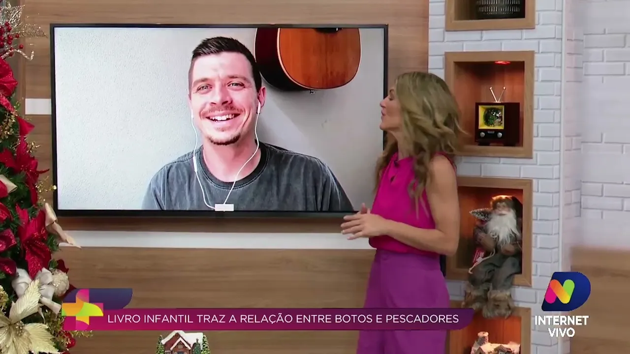 Livro infantil destaca relação entre botos e pescadores de Laguna