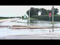 Heavy rain in Central Illinois floods roads fields