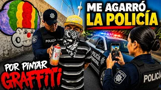 Policía vs graffitero pinta de carácter 