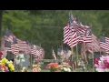 Volunteers install thousands of flags at McLaren s Resthaven Cemetery