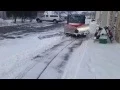 Gravely Atlas with SnowDogg V-Plow clearing snow