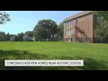 Neighbors upset over proposed housing near Davenport historic school building