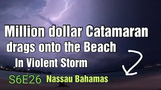 Big Catamaran goes right up on the beach during thunderstorm. S6E26