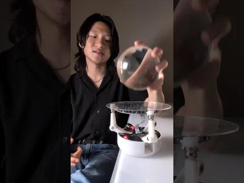balancing glass ball
