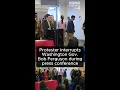 Protester escorted out after disrupting Washington Gov Bob Ferguson speech