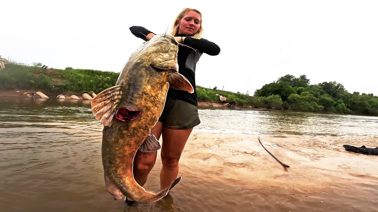 YouTuber Nearly gets TRAPPED UNDER WATER while hand catching a RIVER MONSTER! Noodling for Catfish!