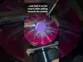 Download Lagu Cleaning a vinyl record with an anti-static brush before playing