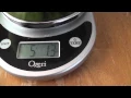Weighing my harvested watermelon