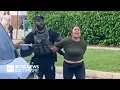 shows Baltimore police response to ICE detaining parents outside of school