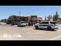Man found with gunshot wound near Phoenix gas station police say