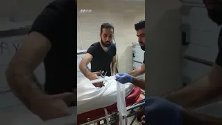 لحظة تجفين الشهيد عبد الباسط ساروت 