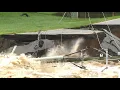 Flooding collapses entire road on north side of Indianapolis