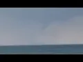 captures waterspout over Lake Huron