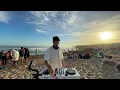 playing Afro House on the beach until people dance