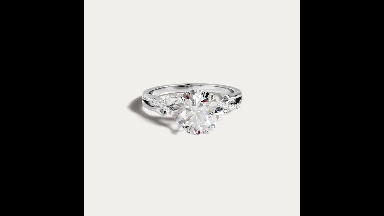 Caroline丨Round Cut Leaf-Inspired Intertwined Pavé Engagement Ring