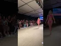 Sofia Jamora opening the Abyss by Abby runway show with a sexy and modern hot pink bikini