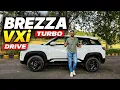 2026 New Maruti Brezza VXi Turbo all Details Drive Impression Car Quest