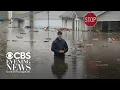 Dozens need rescuing in Indiana as streets turn to rivers amid flooding emergency