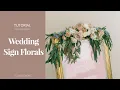 Adding Fresh Flowers to Your Wedding Signs