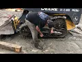 Changing tracks on John Deere 323D skid steer Part 1 - jacking up