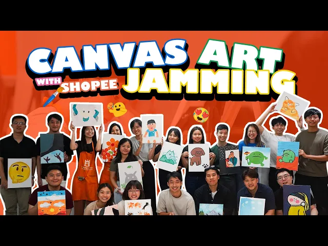 Shopee staff hold up the canvases they painted