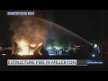 Structure fire destroys barn in downtown Millerton