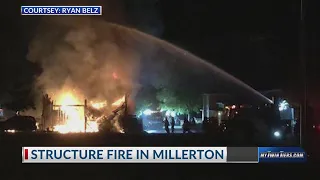 Structure fire destroys barn in downtown Millerton