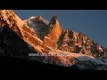 Aiguilles du Dru in Chamonix : Sunset time lapse of the rockfall face of Les Drus in the French Alps