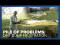 Dirt pile towering over Colerain homes draws complaints calls for solutions