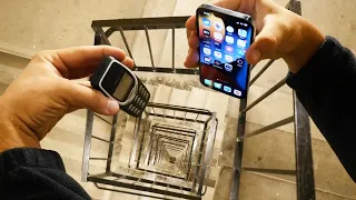 Download Dropping an iPhone 13 Pro vs Nokia 3310 Down Spiral Staircase 20 Stories - Will it Survive MP3