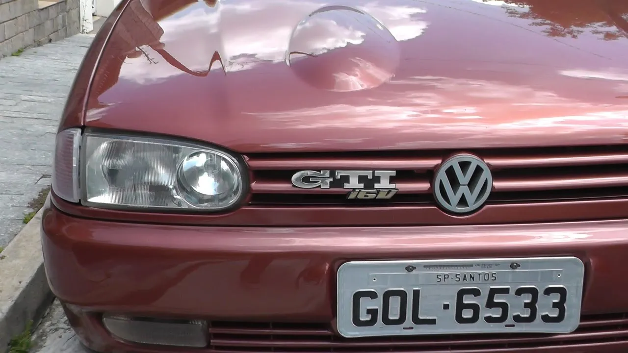 VW Gol GTI 16v 4 portas vermelho cobre // Caçador de Carros