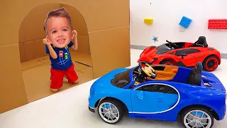 الفتى ونيكي اللعب مع لعبة السيارات   مجموعة الفيديو سيارة للأطفال دندنها