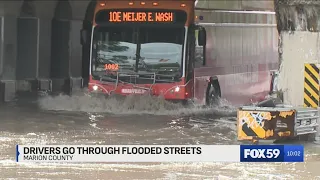 Indy drivers continue to drive through flooded streets