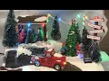 carol town collection lit up and moving at lowe s CHRISTMAS VILLAGES