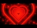 Download Lagu Neon tunnel of red hearts on a starry black background. Video Loop
