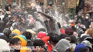 massive snowball fight in washington square park under a blizzard