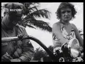 Download Lagu Miami Meisjes in badpakken rijden op scooters (1937)
