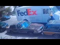 FedEx Driver Throws Package In Front Of The Gate Instead Of Leaving it on the Porch In Brooklyn NY