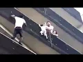 Video di Malian hero scales Paris building to save child